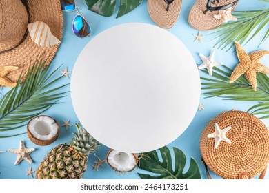 Summer vacation and travel holiday background, sale and invitation flat lay, with tropical leaves, flip flops, straw hat, sunglasses and bag, coconut and pineapple tropical sweet fruits.  - Powered by Shutterstock