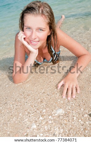 Summer vacation - young girl at the beach