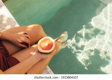 Summer Vibes In The Pool, Eating A Pink Grapefruit