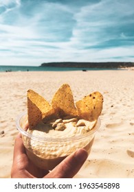 Summer vibes, relaxing beach picnic of nachos