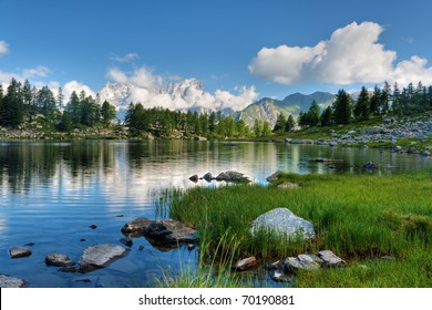 summer view of Arpy lake near La Thuile, Aosta valley, Italy. Image processed with hdr technique - Powered by Shutterstock