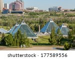 Summer view of a modern building (muttart conservatory) and its reflections, Edmonton, Alberta, Canada