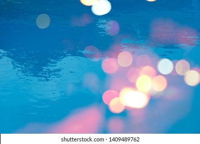 Summer Wave Blue Pool Water With Colorful Bokeh Light Night Party Background