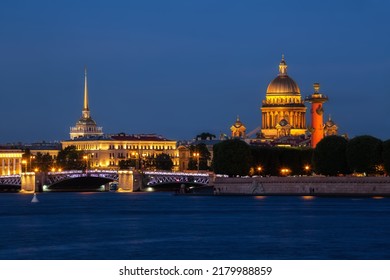 Summer white night in St. Petersburg. View of the illuminated Palace Bridge, St. Isaac's Cathedral and the Admiralty Spire - Powered by Shutterstock