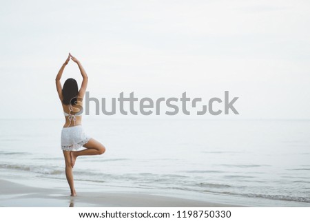 Similar – Image, Stock Photo Women doing pilates on the beach