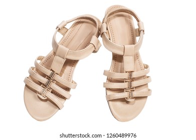 Summer women's beige sandals on a white background for women and girls. Isolated