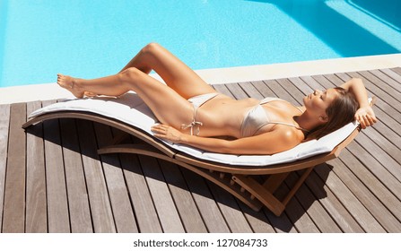Summer Young Woman Sunbathing In Bikini