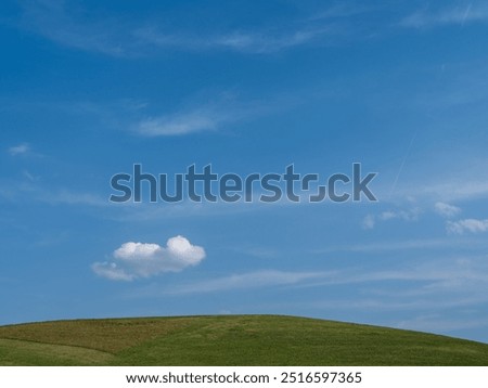 Summerlandscape with Rolling Hills and Dramatic Cloud in the Mostviertel, Lower Austria