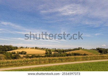 Summerlandscape with Rolling Hills and Dramatic Cloud in the Mostviertel, Lower Austria