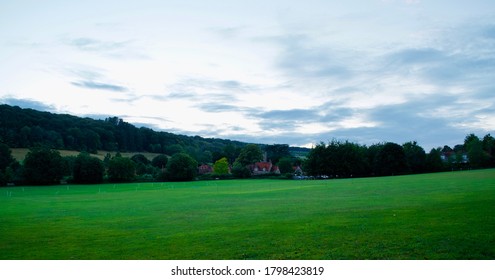 Summer's Evening Overlooking A Cricket Pitch In The British Village Of Hambleden. 