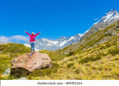 Summertime , Asian Woman Enjoy Travel At Mount Cook National Park In South Island New Zealand, Concept Of Woman Solo Travel And Relaxation Moment