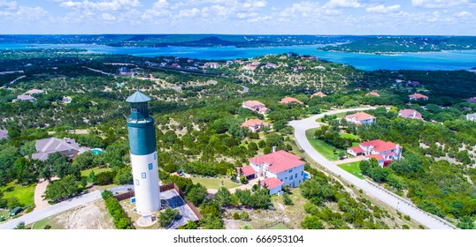 Summertime in Texas Hill country at lake Travis with lighthouse standing over paradise view aerial drone photography