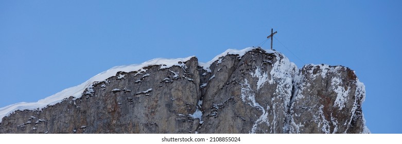 Summit cross on the mountain High Ifen 2230m