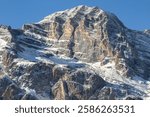 The summit of the majestic Tofana di Mezzo (3244m) and the two cable car stations. Ra Valles (2470m on the left) and Cima Tofana (3244m)