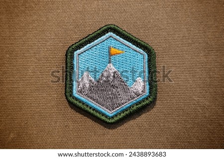 The Summit morale patch is a velcro patch used for attaching to clothing and bags.