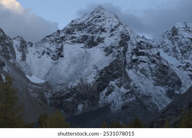 The summit of Pizzo Rachele in Val Ventina on the Rhaetian Alps. Snow-capped mountain - Powered by Shutterstock