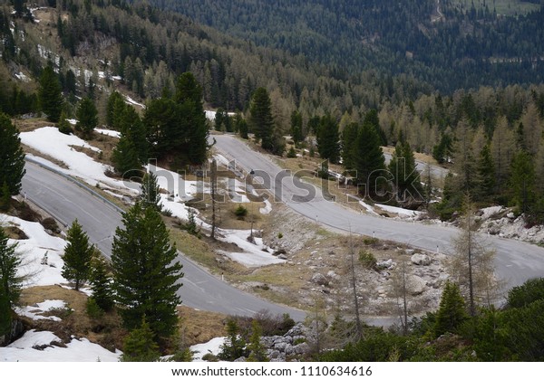 Summit
road in the summer. The road on snow mountain
