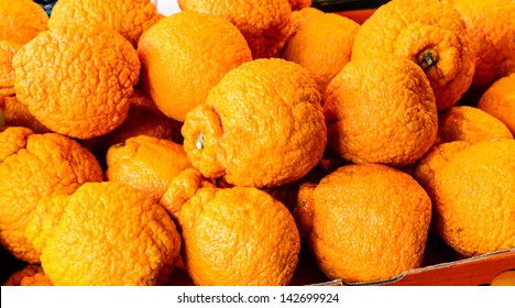 Sumo Mandarin Oranges On Market Stand