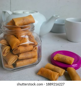 Sumpia Udang Or Prawn Chopsticks Or Mini Spring Roll In A Jar, White Background. Selective Focus