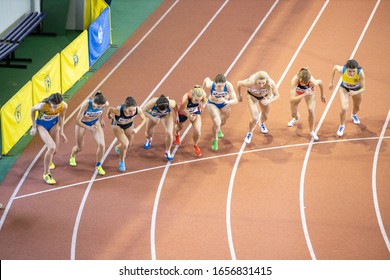 SUMY, UKRAINE - FEBRUARY 22, 2020: Start Of 1500m Final Race At Ukrainian Indoor Track And Field Championship 2020.