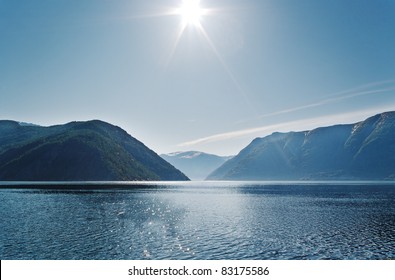 Sun Above Mountains, Fjord In The Norway.