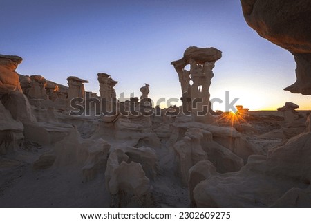 The sun and the Alien throne rock formation, Bad Lands, New Mexico