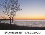 The sun is almost risen as the pre-dawn glow reached its peak, Europe Bay, Lake Michigan, from Newport State Park, Door County, Wisconsin