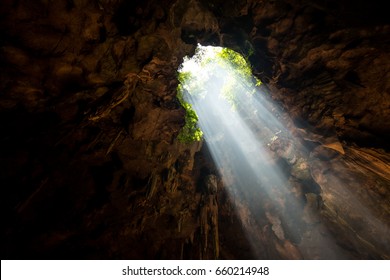 Sun Beam Through The Hold Of Cave.