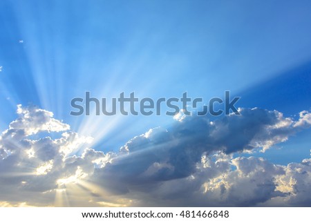 Sun beams or light rays breaking through the clouds. Beautiful spectacular conceptual meditation background.
