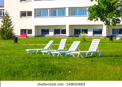 Sun beds in front of the building