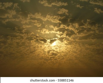 Sun Behind Clouds