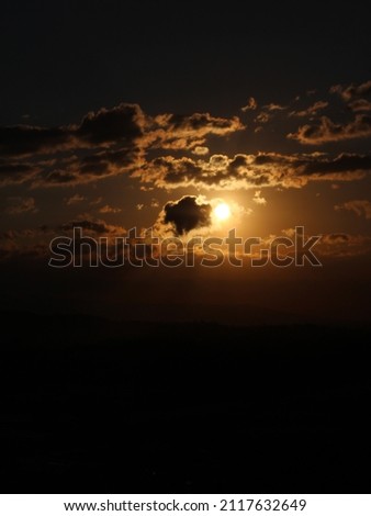 Sun behind clouds during sunset in Costa Rica