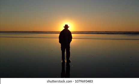 sun behind a man - Shutterstock ID 1079693483