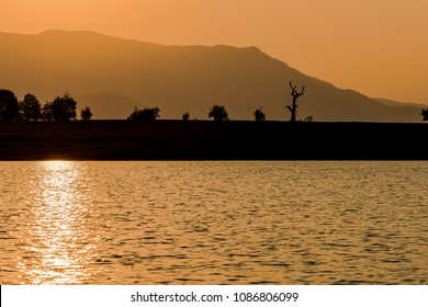 The Sun behind the Mountain 