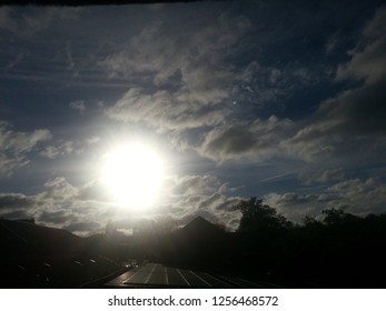 Sun and blue clouds