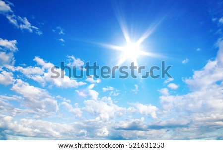 Sun in blue sky with cloud