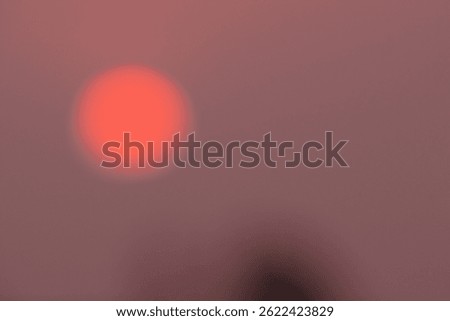 Sun blurred orange background image