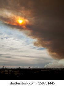 Sun Breaking Through Bushfire Smoke Clouds Over The Parramatta Skyline In Sydney, NSW, Australia