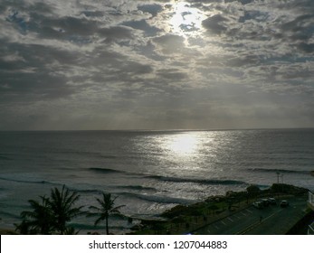 Sun Breaking through clouds over ocean