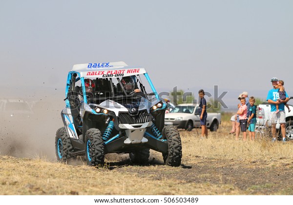 Sun City,\
South Africa - OCTOBER 1, 2016: Front view of Speeding blue and\
white Maverick 1000T Turbo rally car in race at Sun City 450 Rally\
Racing event, Sun City, South Africa \
