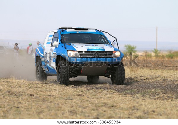 Sun City, South Africa Ã¢?? OCTOBER 1, 2016: Forty Five\
degree close-up view of Speeding blue and white VW Amarok twin cab\
rally car in race at Sun City 450 Rally Racing event, Sun City,\
South Africa  