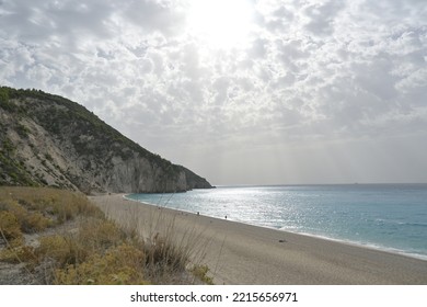 Sun And Cloud Over Mylos Beach Near Agios Nikitas On North West Corner Of Lefkada Island, Greece