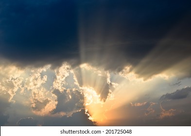 Sun And Clouds After A Storm At The Sunset.