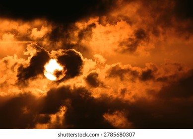 Sun with clouds at dawn.
