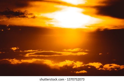 sun and clouds at sunset