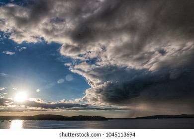 The sun coming out after a thunderstorm moves on over Lake Champlain.