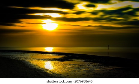 Sun Coming Up Over Florida Beach