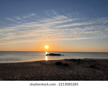 The Sun Coming Up Over The Ocean