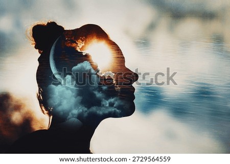 Sun and crescent moon behind clouds in female head. Mindset duality psychology of woman concept. Multi double exposure in-camera image. Profile silhouette portrait of young woman against the cloudy sky. Brain and mental health in modern world.