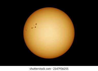 Sun in dark space with solar spots on the 20th April 2022